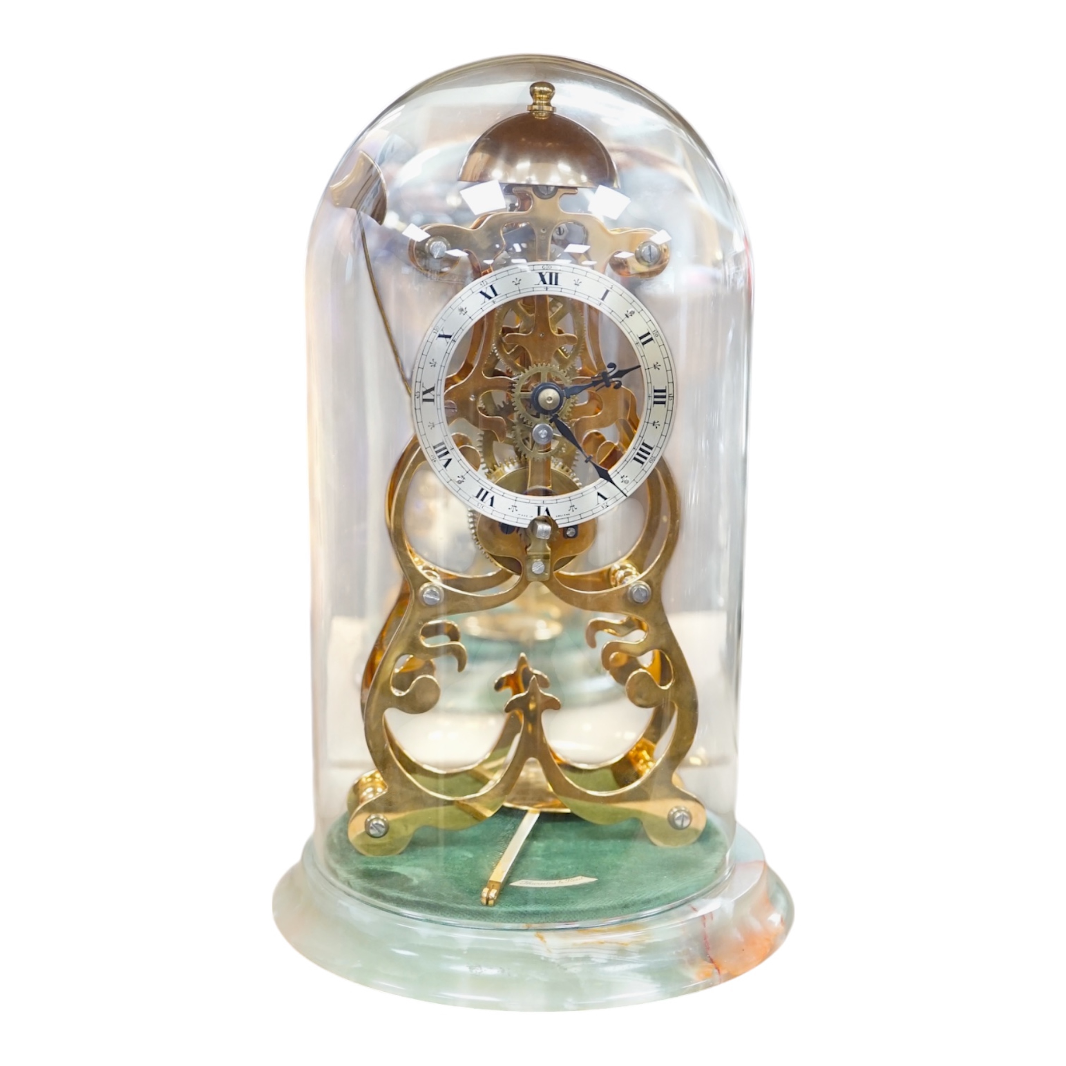 A Thwaites & Reed brass skeleton clock under dome, on onyx base, 27cm. Condition - good, not tested